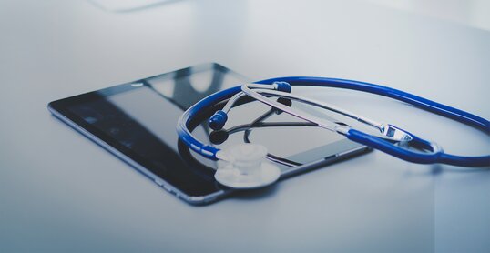 stethoscope on computer keyboard