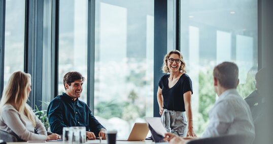 Business people having casual discussion during meeting