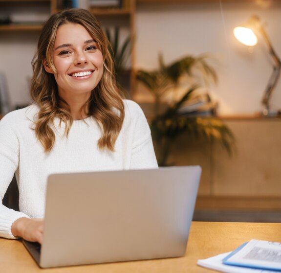 Successful young businesswoman working in office