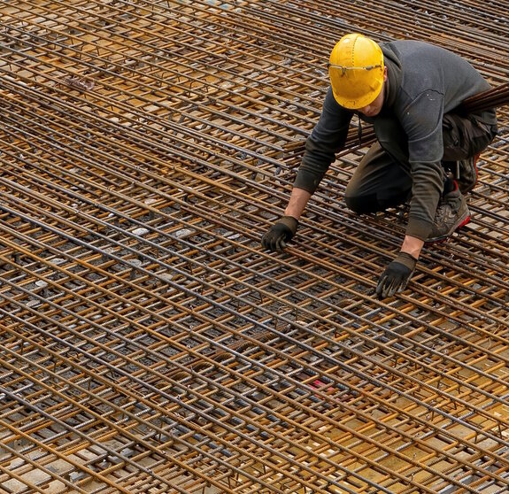 Eisenleger bei der Arbeit